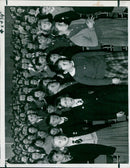 A 4x4 vehicle is seen driving through a desert landscape. - Vintage Photograph