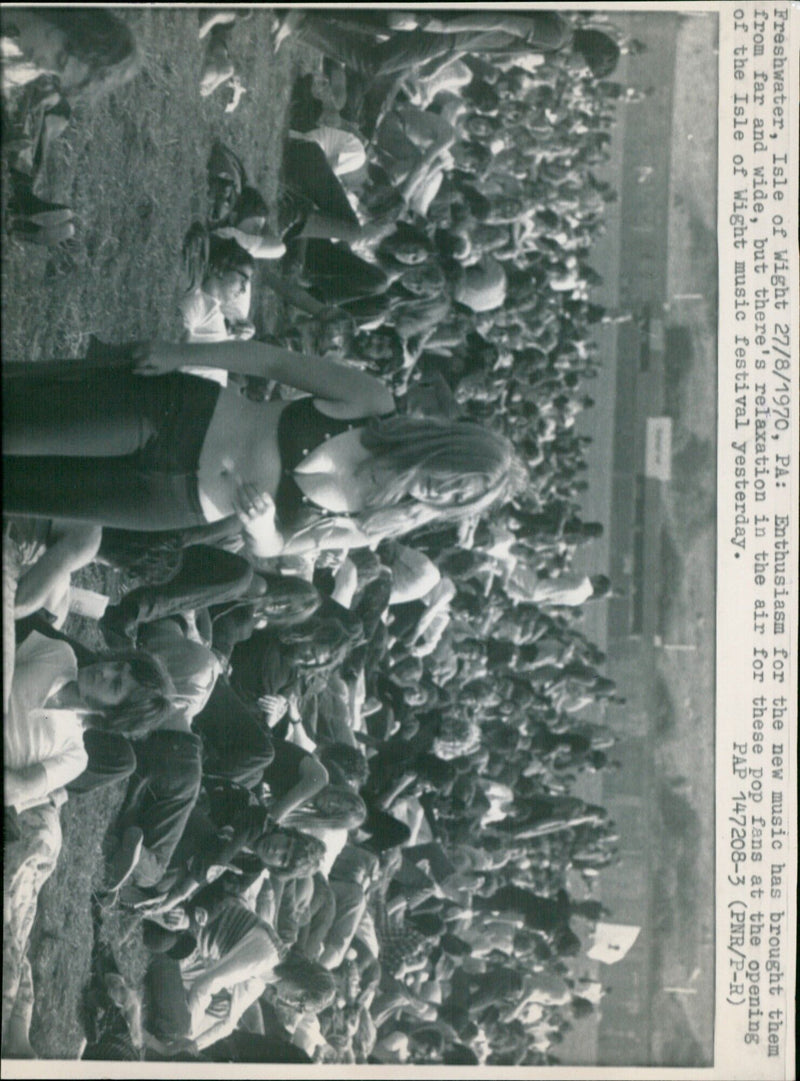 Pop fans enjoy the opening of the Isle of Wight music festival. - Vintage Photograph