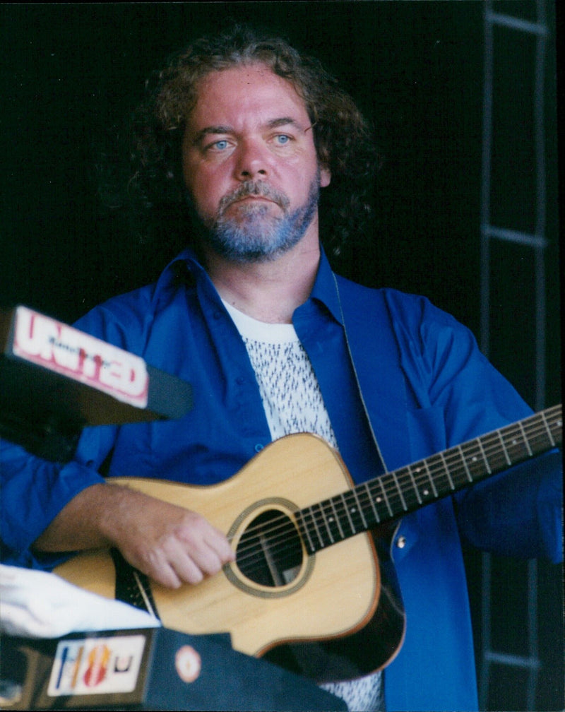 Musicians and fans gather at the Cropredy Festival to reunite and celebrate music. - Vintage Photograph