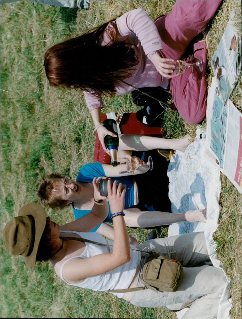 Festival-goers enjoying music and cooling off at the Charlbury Riverside Festival. - Vintage Photograph