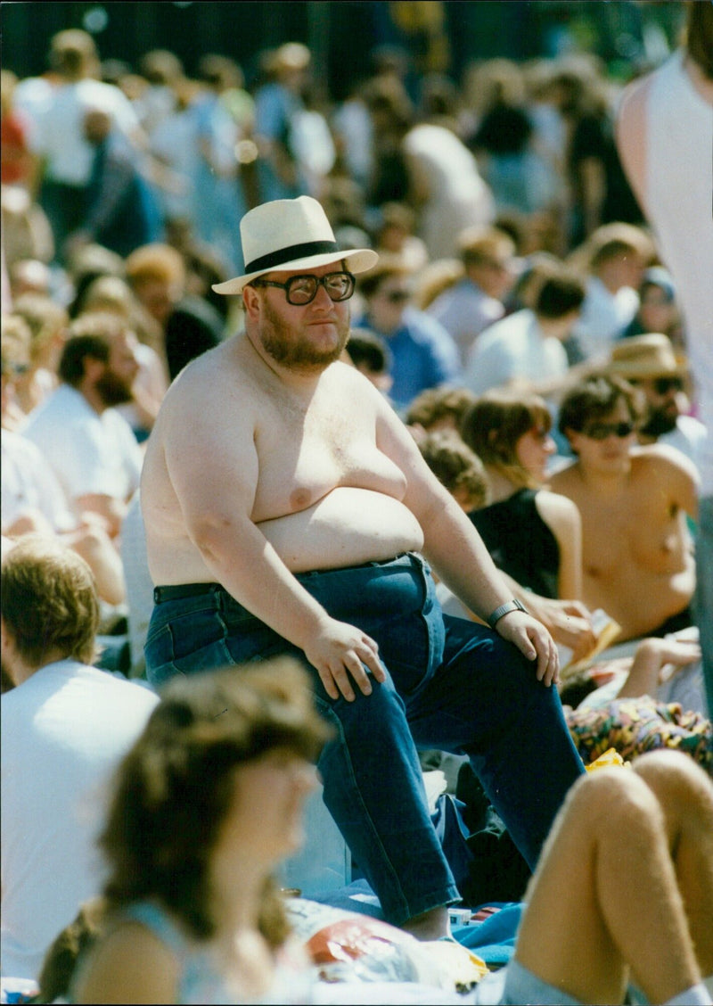 Hundreds of fans enjoy a music festival in Domantan. - Vintage Photograph