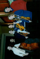 A group of musicians rehearsing with Michael Bochmann at the FEST Music Group. - Vintage Photograph