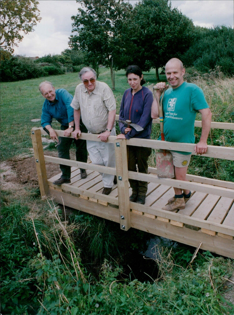 Volunteers construct a bridge at the Mowbray Road Nature Reserve. - Vintage Photograph