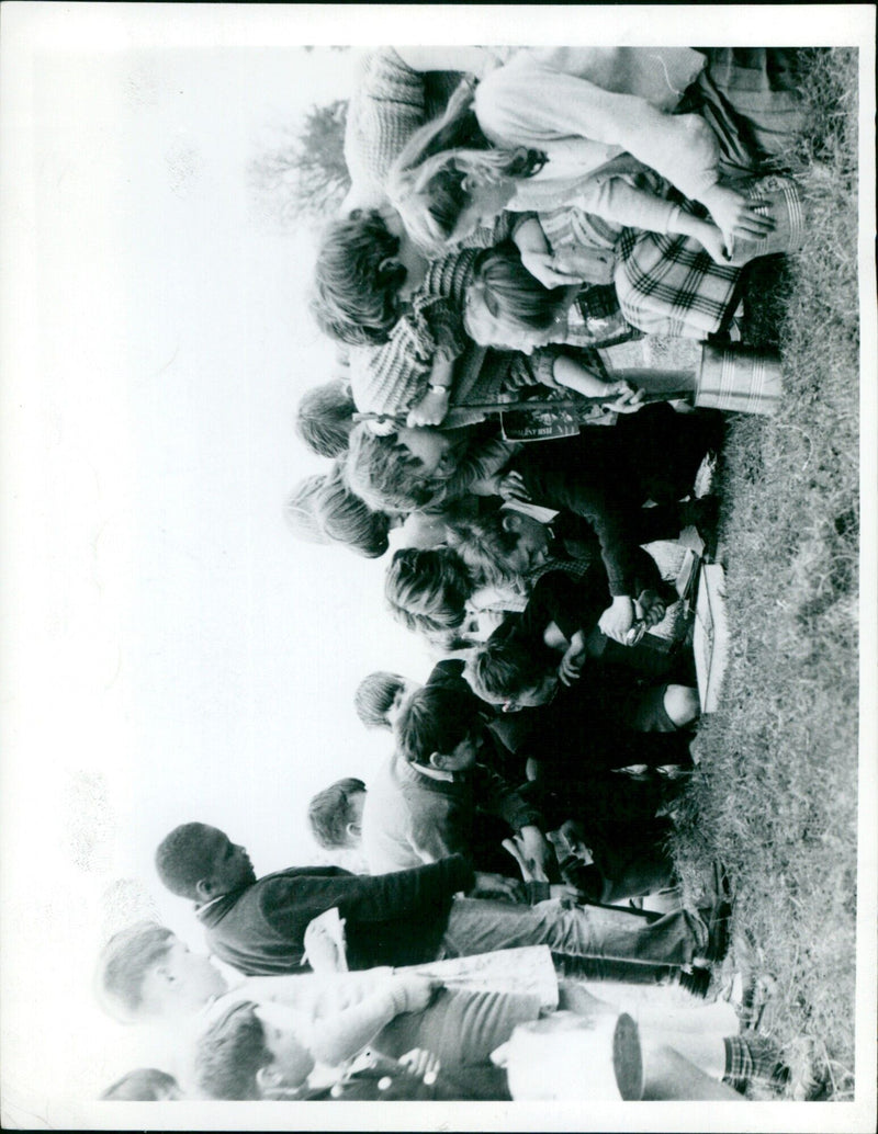 People fishing and paddling in a canoe in a lake on Nature Week. - Vintage Photograph