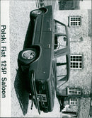 A Polski Fiat 125P Saloon sits parked on the street. - Vintage Photograph