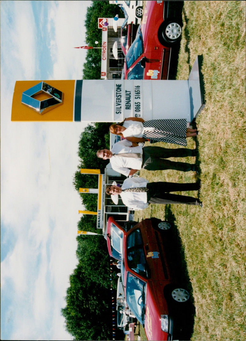 Racing cars from Renault and Citroën compete in the Silverstone Circuit. - Vintage Photograph