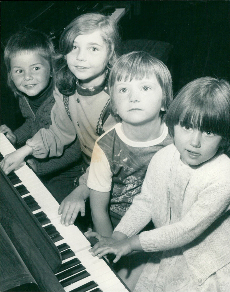 Two friends enjoying a musical moment together. - Vintage Photograph