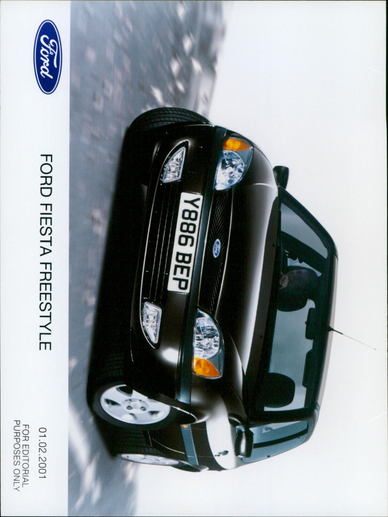 A Ford Fiesta Freestyle parked on the street. - Vintage Photograph