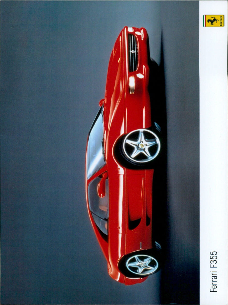 A Ferrari F355 parked in a sunny street. - Vintage Photograph