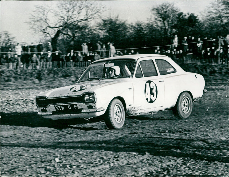 A Ford Escort is tested in preparation for the Monte Carlo Rally. - Vintage Photograph