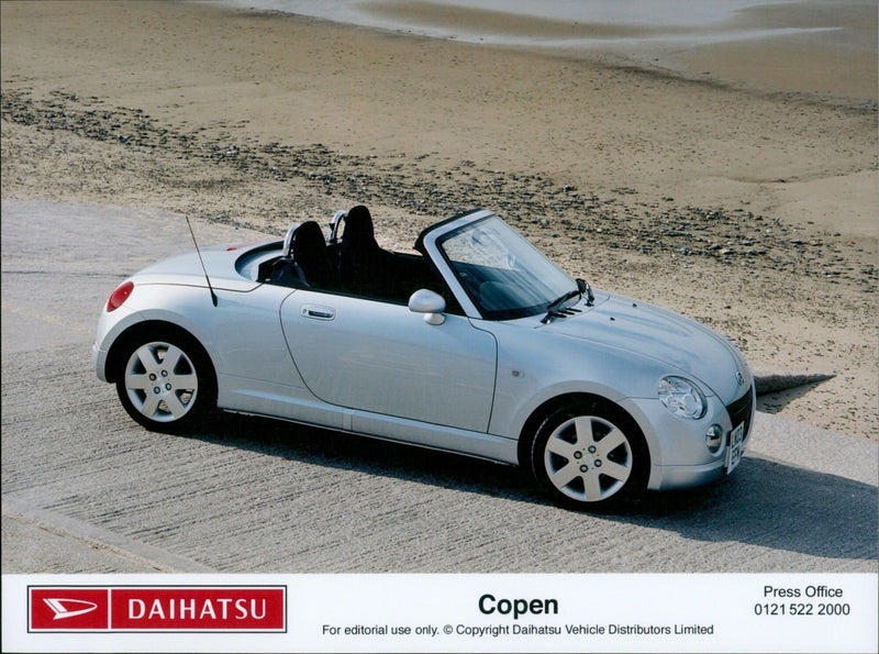 Daihatsu unveils its all-new Copen car model in Birmingham, UK. - Vintage Photograph