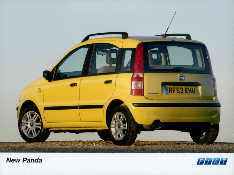 A new Fiat RF53 EHU FTAT on display in a dealership. - Vintage Photograph