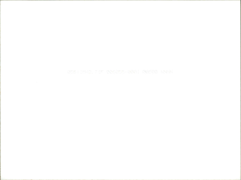 Daihatsu 7 Sirion 1.0 E car model displayed at a press event. - Vintage Photograph