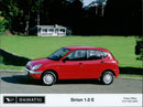 Daihatsu 7 Sirion 1.0 E car model displayed at a press event. - Vintage Photograph
