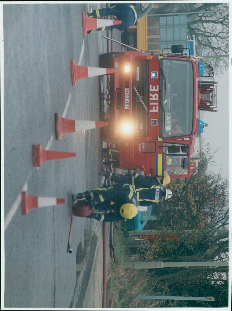 Firefighters respond to a blaze at the Farmer Gosford All Blacks Rugby Club. - Vintage Photograph