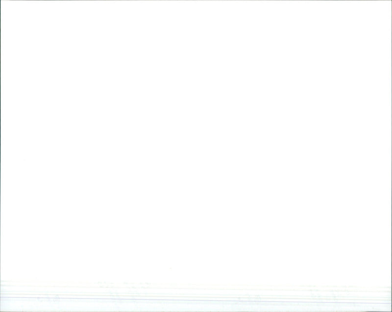 A man admires a 2005 Honda FR-V H, one of the first models released under the company's "The Power of Dreams" slogan. - Vintage Photograph