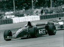 Jean Alesi driving a Ferrari in the 1995 British Grand Prix. - Vintage Photograph