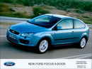 Ford unveils the new Focus 3-door model. - Vintage Photograph