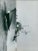 The Royal Navy's Brave Borderer, the world's fastest warship, completes a demonstration in the Salent today, reaching speeds of over 50 knots. - Vintage Photograph