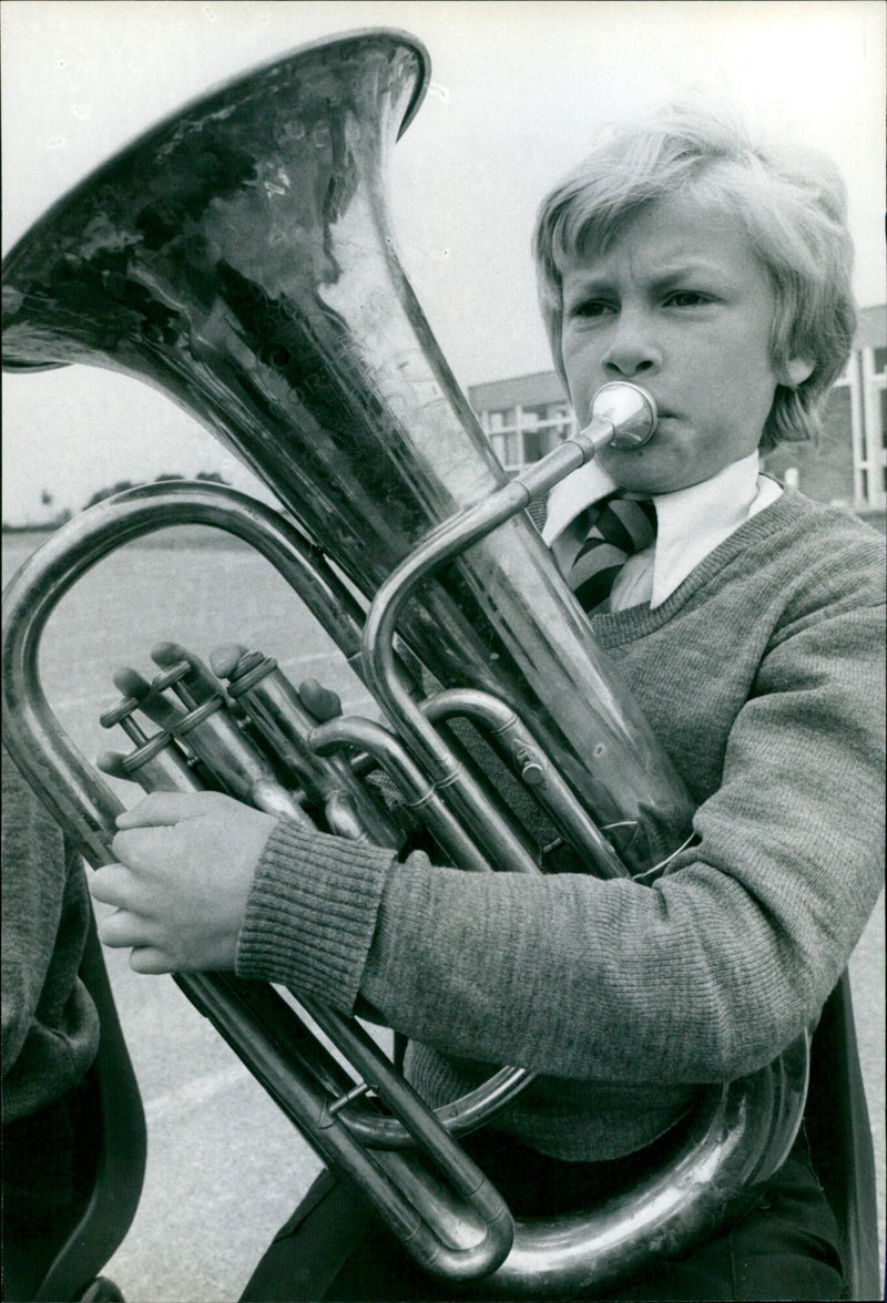 Michael Lee, 11, playing the euphonium on the Stephen Freeman at a brass band concert. - Vintage Photograph