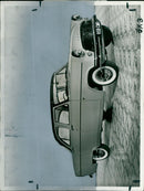 The Consul, a new model of car, is displayed at the Carand showroom. - Vintage Photograph