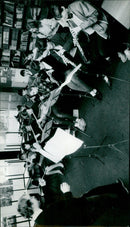 Musicians rehearse under the supervision of John Esaias at Wood Green School in Witney. - Vintage Photograph
