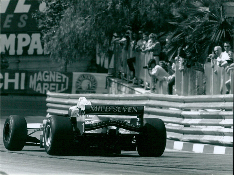 Michael Schumacher celebrates winning the 1995 Monaco Grand Prix in a Benetton Renault. - Vintage Photograph