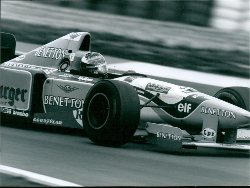 Michael Schumacher, driving for Benetton Renault, is the winner of the 1995 European Grand Prix in Nurburgring, Germany. - Vintage Photograph