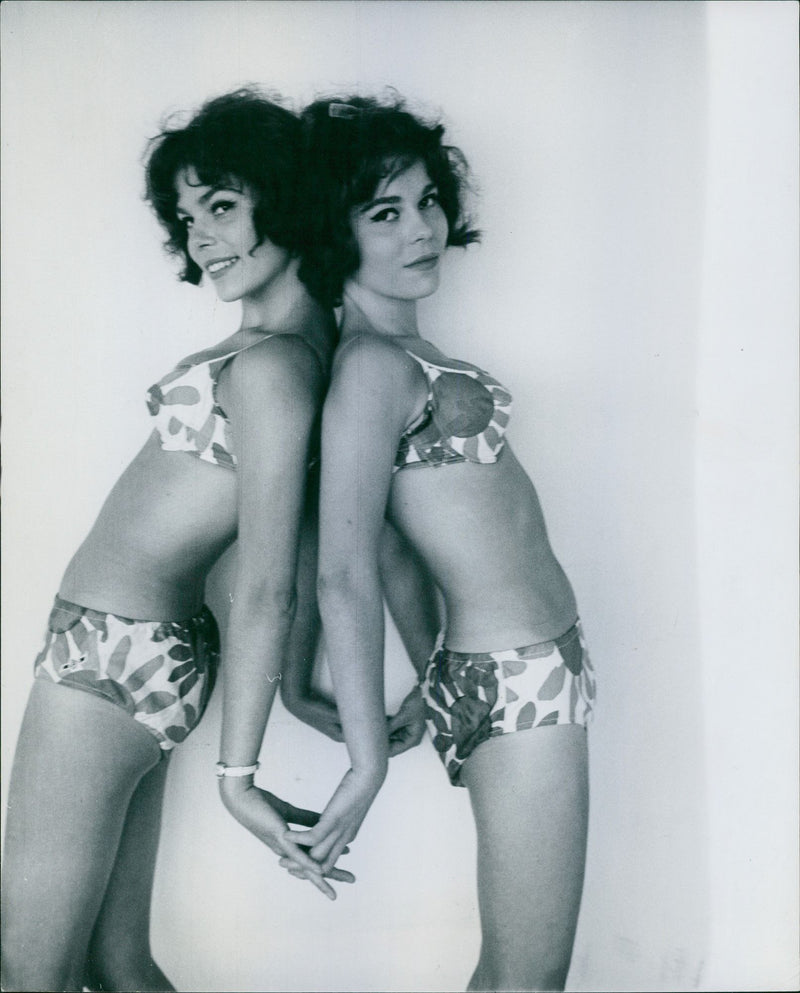 Lykke Nielsen with her sisiter, Helle Nielsen wearing a bikini, 1964. - Vintage Photograph