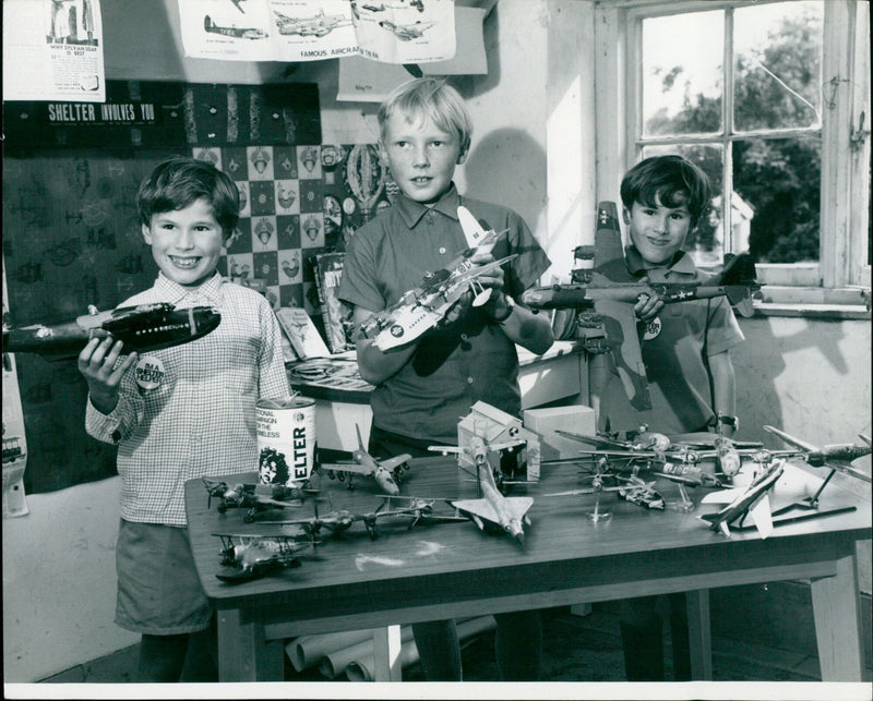 Three boys host a model aircraft exhibition at Marston. - Vintage Photograph