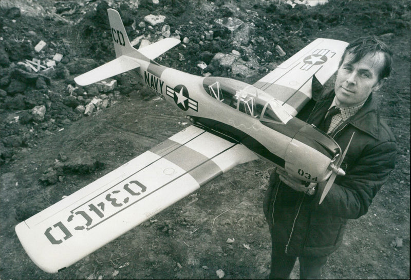 Mr. Witts presenting a model of a U.S. Naval T28. - Vintage Photograph