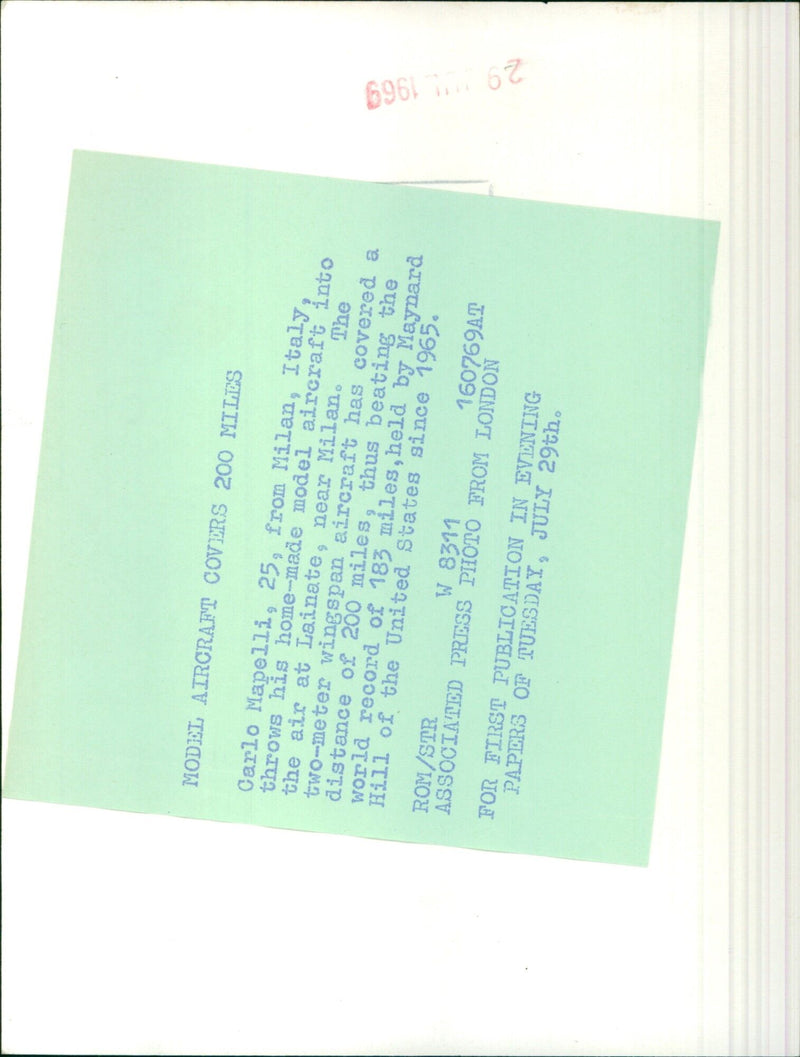 Carlo Mapelli throws his home-made model aircraft, which has covered a distance of 200 miles, in Lainate, Italy. - Vintage Photograph