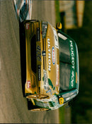 An MSD Auto Trader Peugeot 406 vehicle with Esso Ultron D'Solomon's 406E tires and Michelin Sün MSD Trader wheels. - Vintage Photograph