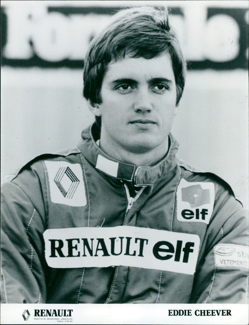 Eddie Cheever Jr. of Team Renault UK Ltd. poses in the pits at the 1986 British Grand Prix. - Vintage Photograph