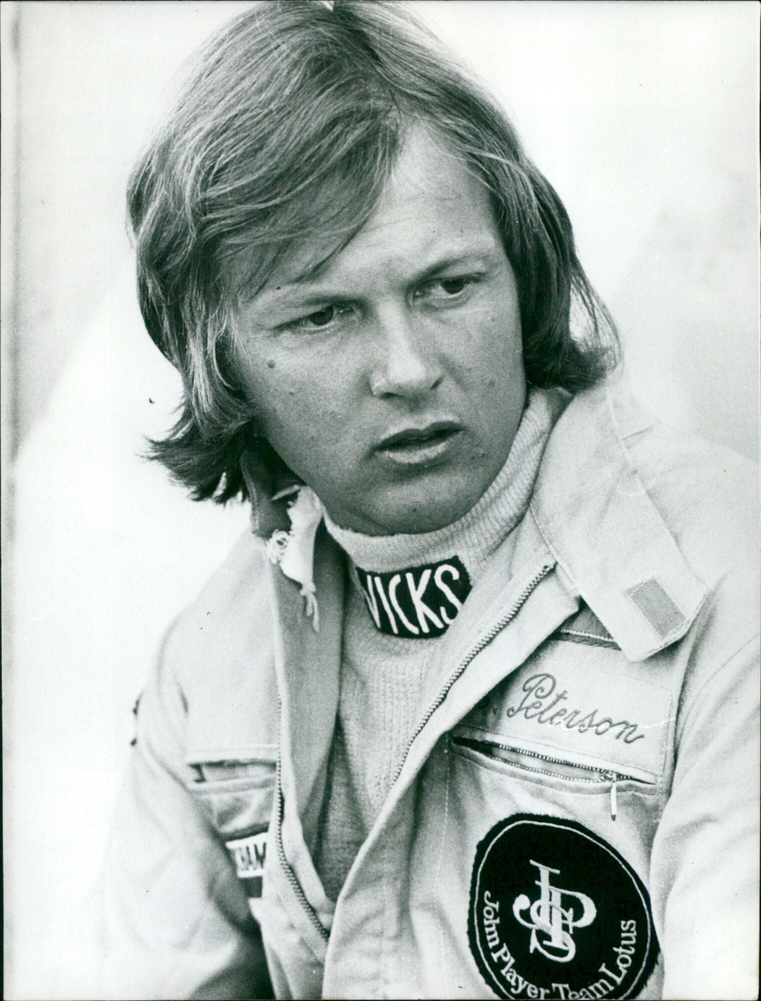 Racing driver Ronnie Peterson poses for a portrait in 1974. - Vintage