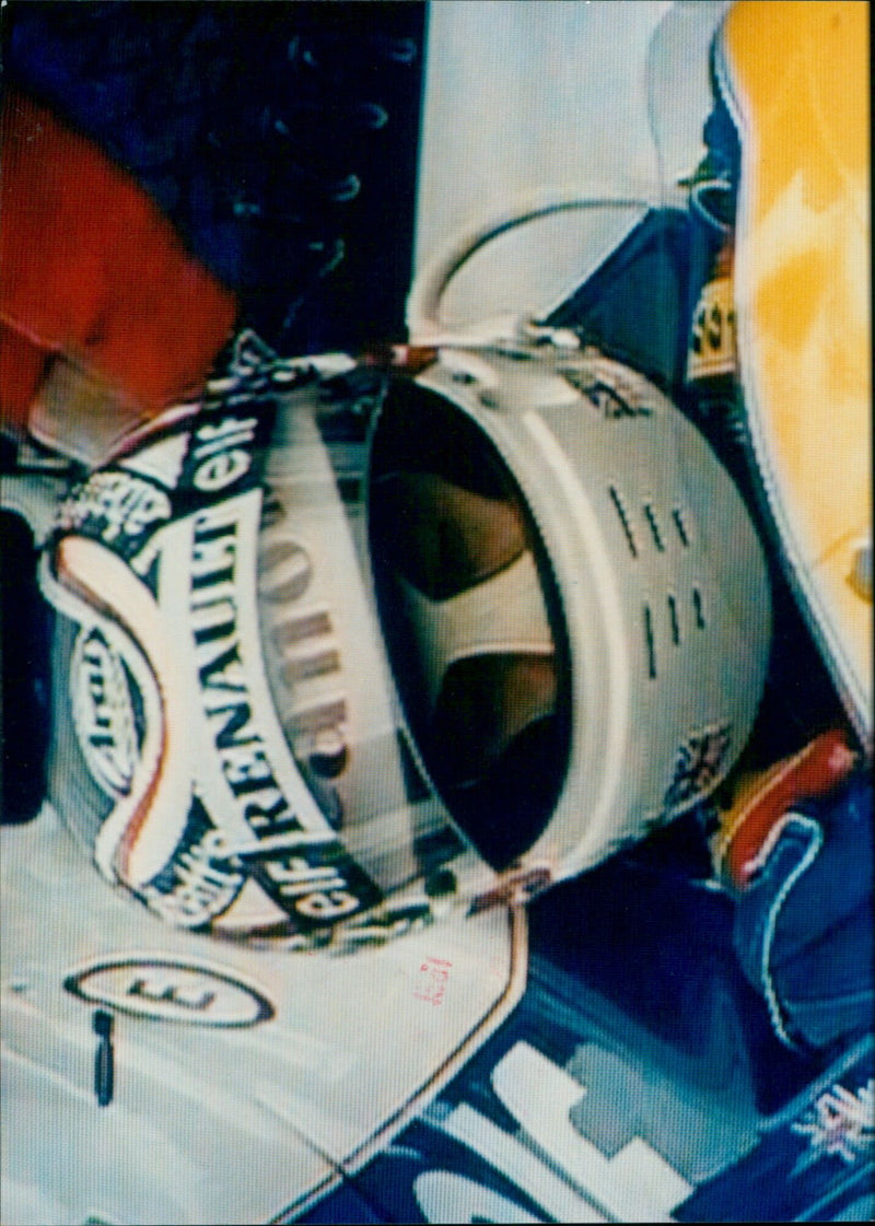 Nigel Mansell in his Ferrari F1 car at the Silverstone circuit. - Vintage Photograph