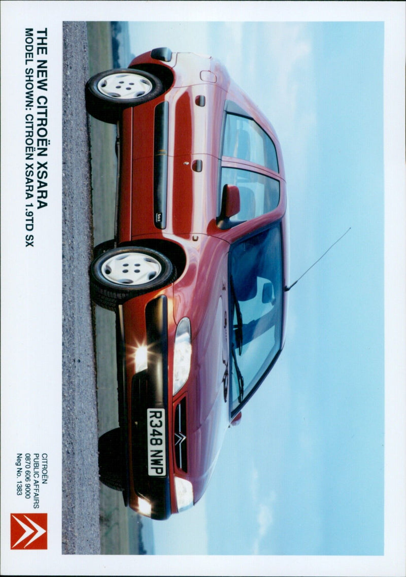 Citroën unveils its new XSARA model at a public event. - Vintage Photograph