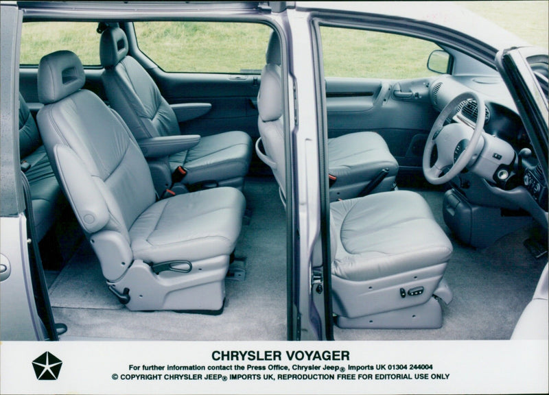 The Chrysler Voyager is displayed at an event in the UK. - Vintage Photograph