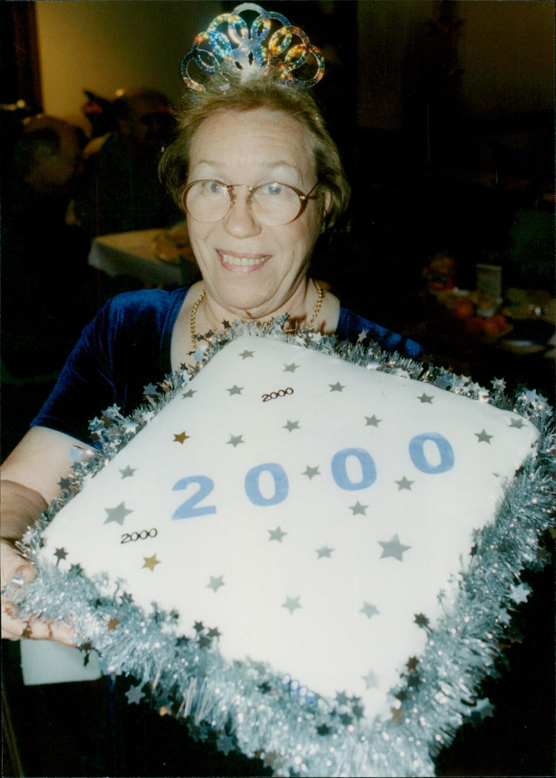 On January 1, 2000, the towns of East and West Hanney celebrated the Millennium with a musical group, Scratch Band, and a cake. - Vintage Photograph