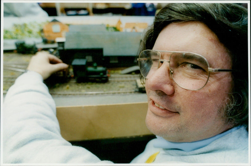 Members of the Abingdon & District Model Railway Club showcase their models at an exhibition. - Vintage Photograph