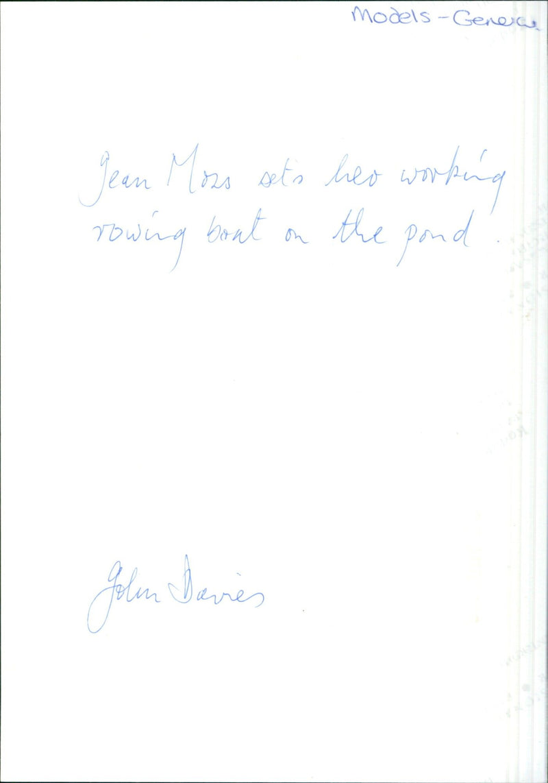 Model Jolen Davies rowing on a pond. - Vintage Photograph