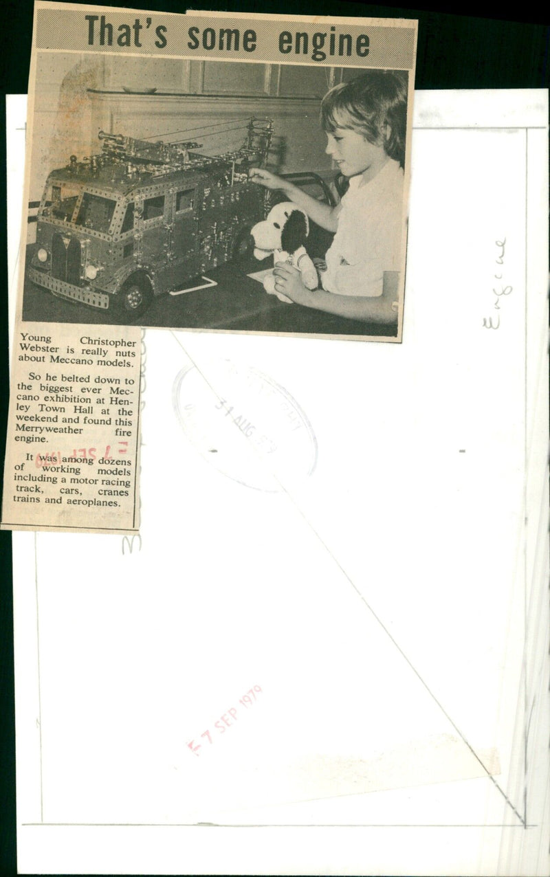 Young Christopher Webster admires a Merryweather engine model at the Mecano exhibition in Henley Town Hall. - Vintage Photograph