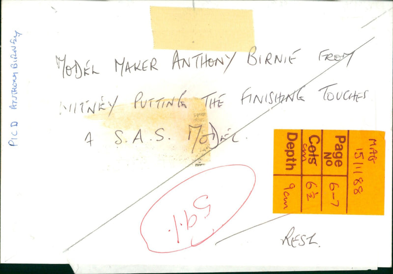 Anthony Birnie, model maker from Hitney, putting the finishing touches on a S.A.S. Most. - Vintage Photograph