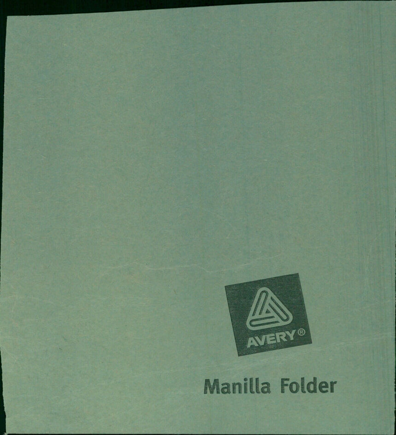 A model train set displayed in a closed AveryⓇ manilla folder. - Vintage Photograph