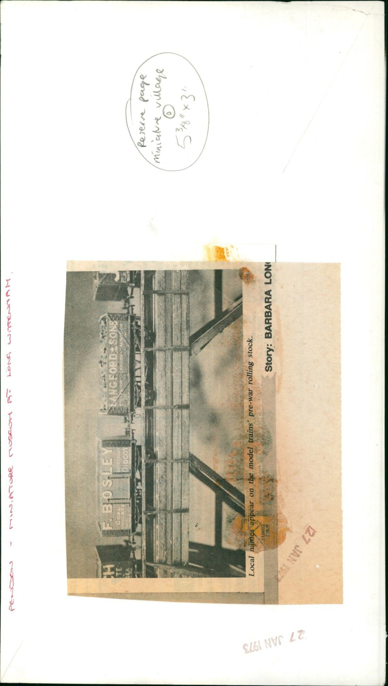 A miniature village model featuring pre-war rolling stock with local names. - Vintage Photograph