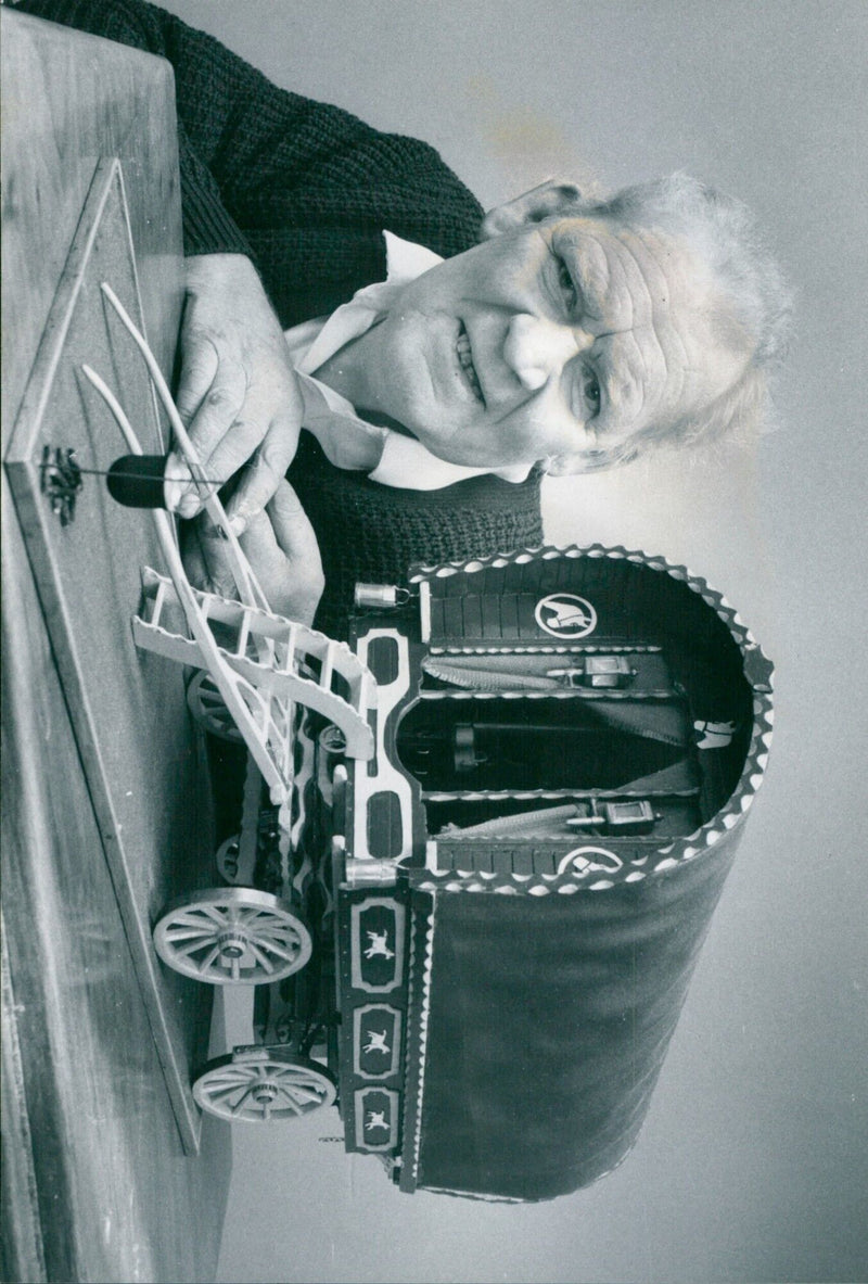 Jock Harris of Fyfield builds a model caravan. - Vintage Photograph