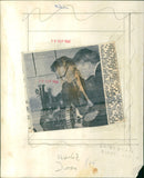 Mr. R. Powell explains the finer points of his model traction engine to Stephen Parker at the A.E.R.E. model exhibition showing at the Harwell social club. - Vintage Photograph