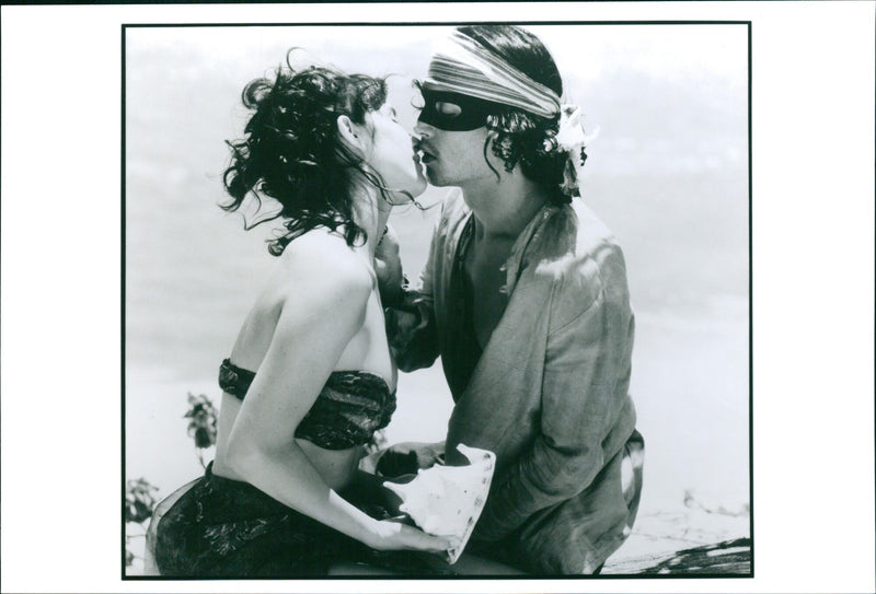 Johnny Depp and Geraldine Pailmas attend the premiere of "Don Juan DeMaro Tu" in Madrid, Spain. - Vintage Photograph