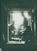 German soldiers in the trenches of the Western Front during World War I, as seen in a photograph taken in 1935. - Vintage Photograph