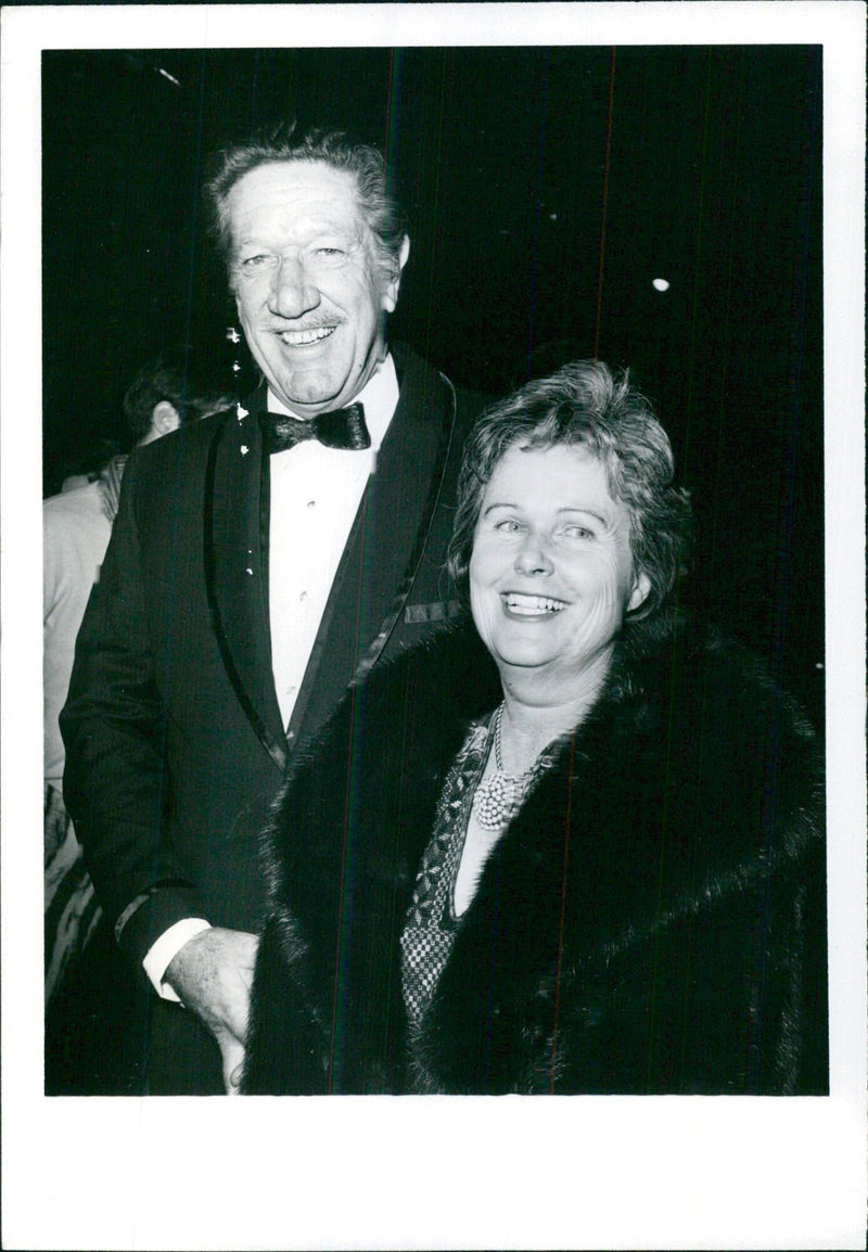 Richard Boone and his wife Claire attend the Hollywood premiere of "Madron" at the Egyptian Theater, co-starring Leslie Caron. Copyright Globe Photos, Inc. 1971. - Vintage Photograph